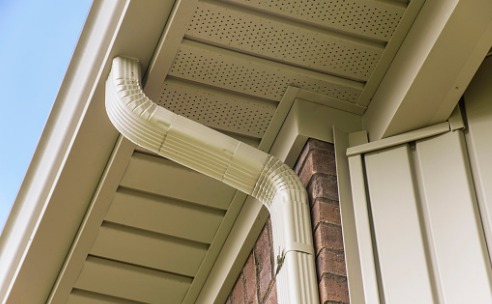 Gutters on a brick house for Gutters in Bloomington IL