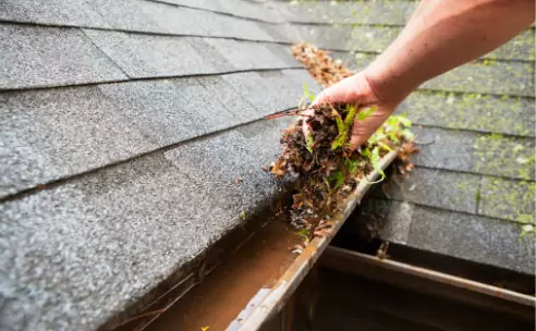 hand-cleaning-copper-rain-gutter